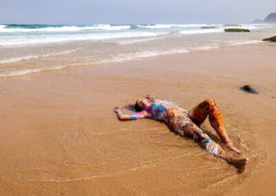 Cleaning Body Painting on the Beach